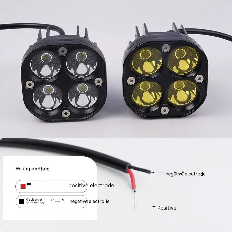 Four-eye automotive headlight with aluminium mounting base, showing four-leaf clover light pattern