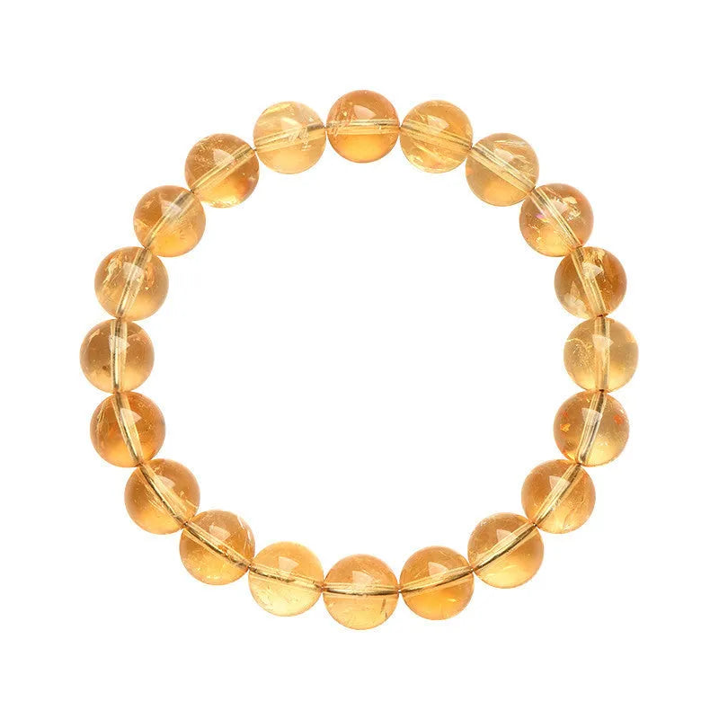 Natural yellow citrine bracelet with geometry-shaped beads in various sizes on display