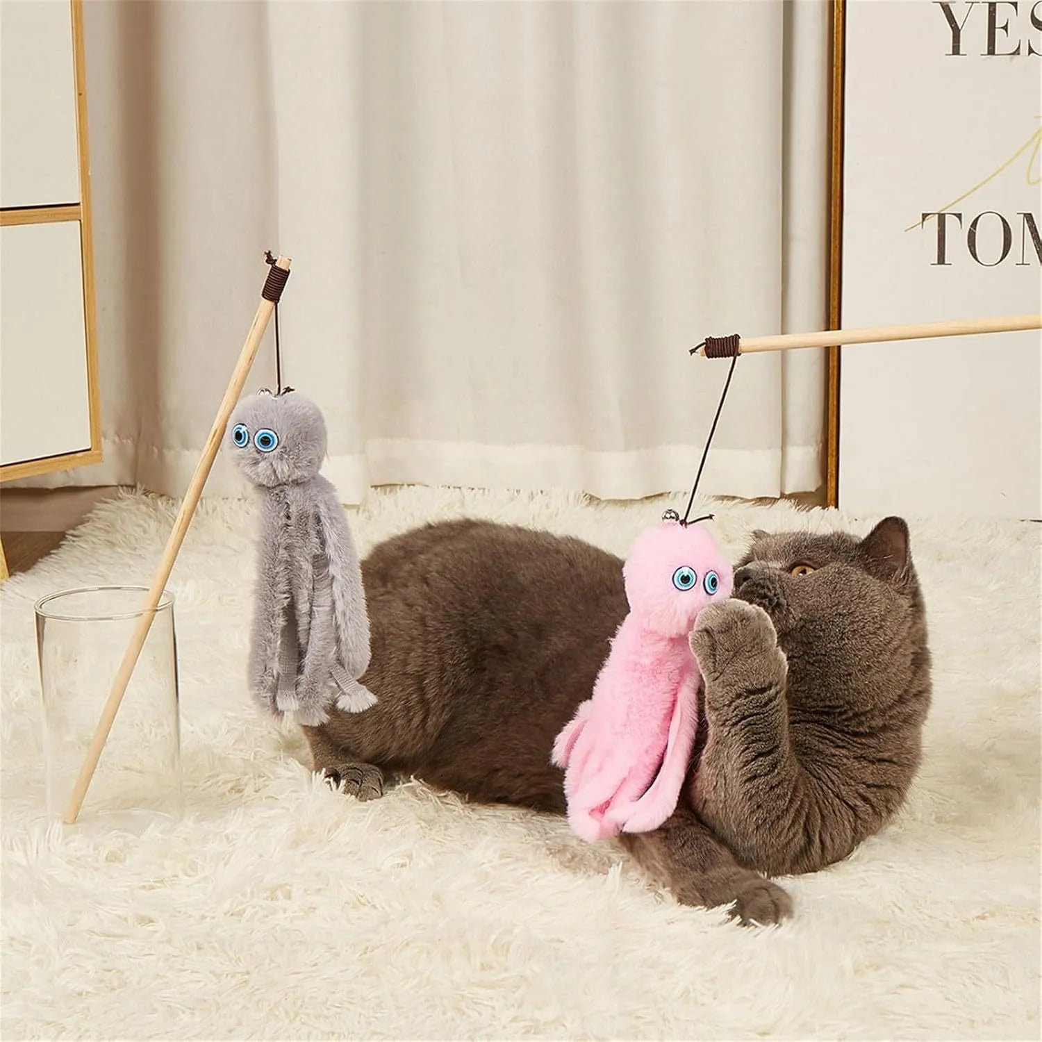 Octopus-themed cat toy with long handle in bright colours for indoor pet play