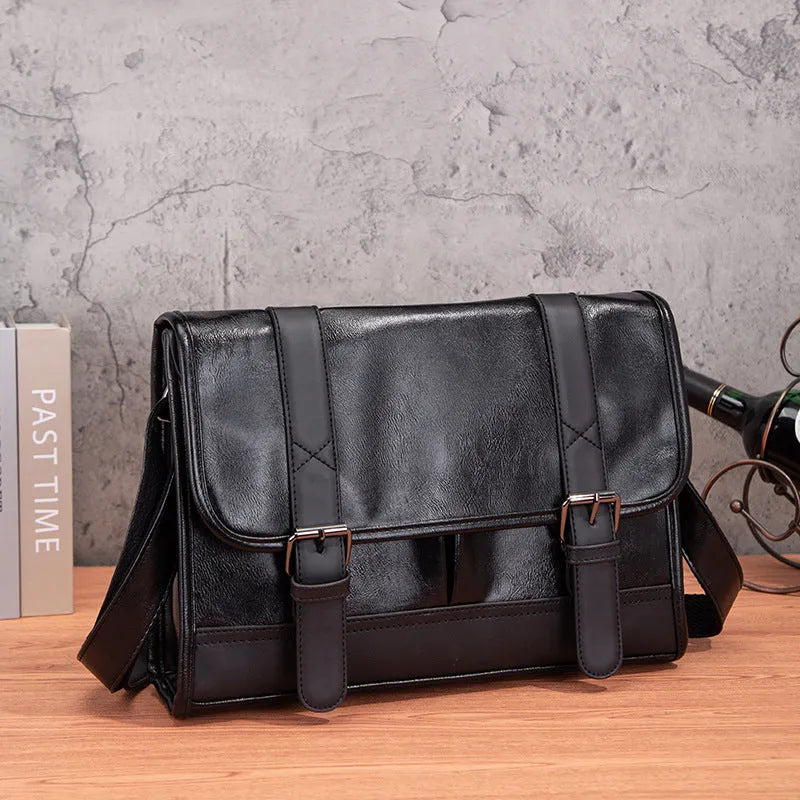 Black Korean-style anti-theft commuter backpack made from PU leather with contrast stitching