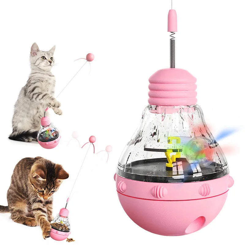 Rocking cat interactive toy with teaser stick and slow food dispenser in pink, purple, or yellow.