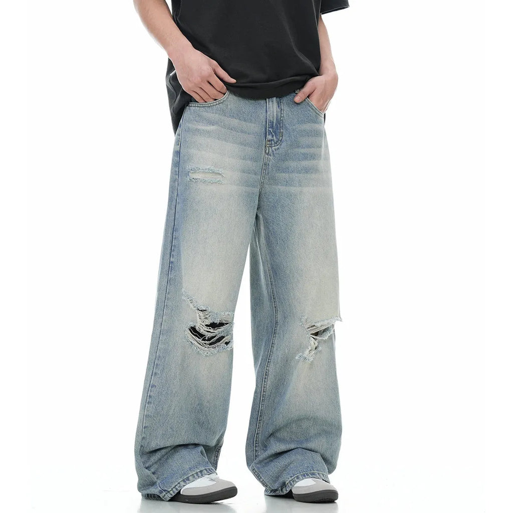 Blue men's straight-leg jeans with ripped detailing on a cotton blend fabric