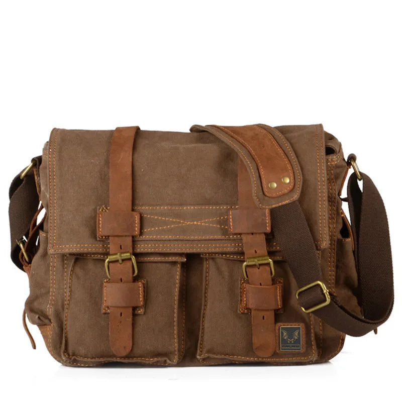 Men's army green canvas crossbody flap bag with leather trim shown open, revealing internal phone and document pockets.