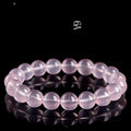 Natural crystal round bead women's bracelet with polished finish in pink colour grades