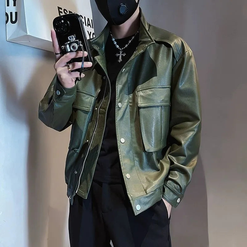 Men's black PU leather pilot jacket with a straight hem and side pocket, laid flat.