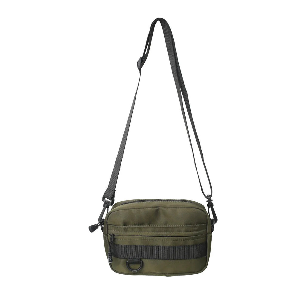 Men's street style nylon messenger bag in black with crossbody strap and sewing thread detailing