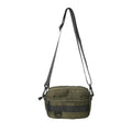 Men's street style nylon messenger bag in black with crossbody strap and sewing thread detailing