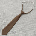 Men's solid navy blue cotton tie on a white background, showing its arrow shape and dimensions.