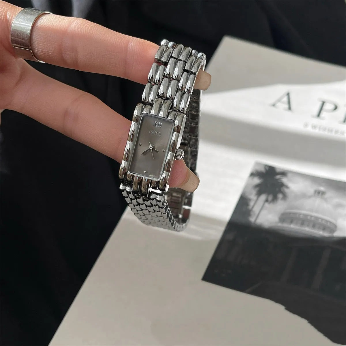 Women's mid-century bracelet watch with 15mm dial, mineral glass, and butterfly buckle in gold or silver options