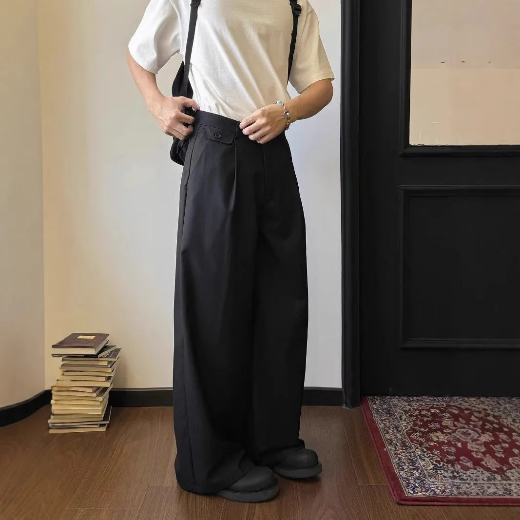 Men's brown straight-leg casual trousers with loose wide-leg design on hanger