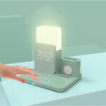 A dark green 3-in-1 Qi wireless charging stand holding a phone, with slots for a smartwatch and earbuds case.