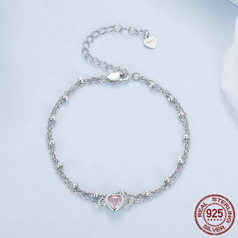 Sweet girlish style 925 sterling silver bracelet with heart pendant on adjustable chain.