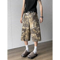 Women's yellow camouflage jeans with snake pattern tooling and cropped leg design