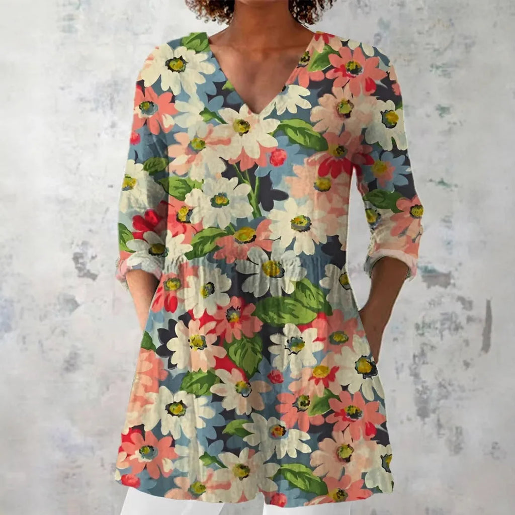Women's retro slim fit printed long-sleeved top in a floral pattern, showing front view.