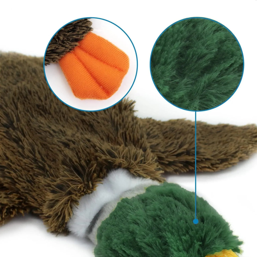 Green stuffless plush dog toy shaped like a duck with two squeakers and a bottle pocket.
