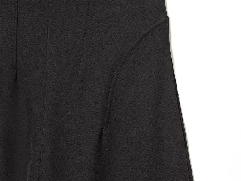 Women's black nylon high-waist zip-front straight-leg trousers on model