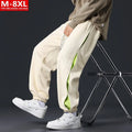 Men's black banded ankle cotton trousers with stitching detail and loose fit design