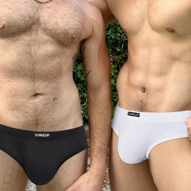 Men's seamless low-waist briefs in black, made from breathable polyester knit fabric.