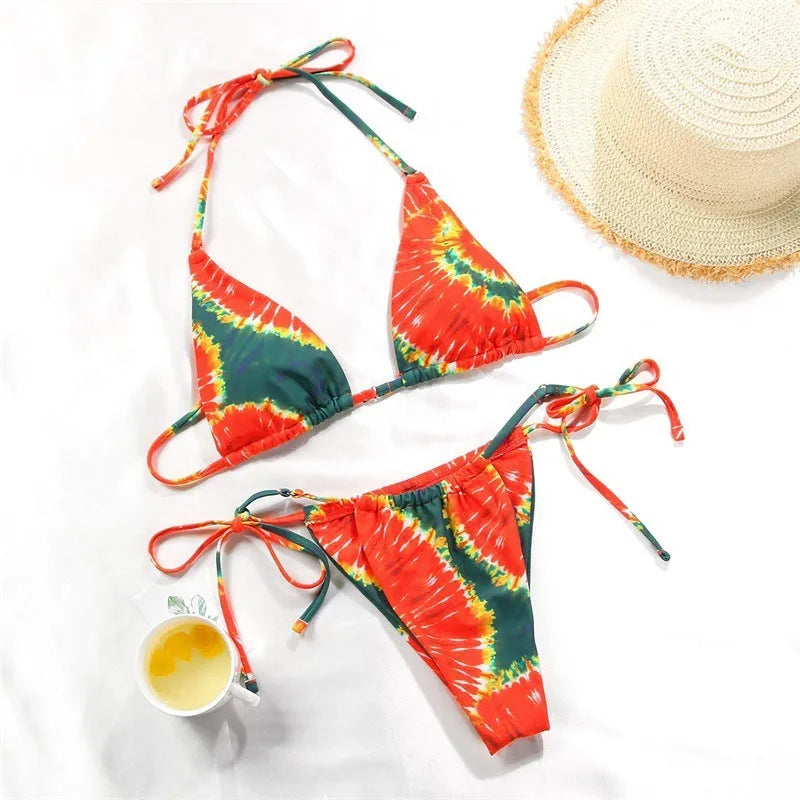 Women's polka dot print split swimsuit bikini set in brown and orange gradient patterns with polyester lining