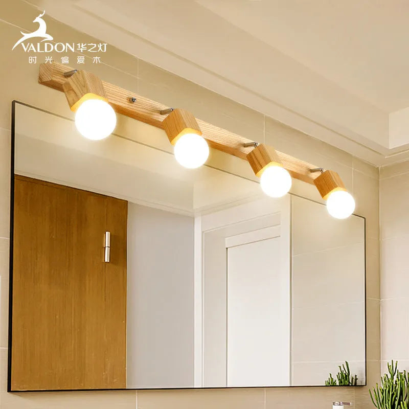 Single-head mirrored cabinet LED wall lamp with a 24cm size on a white wall.