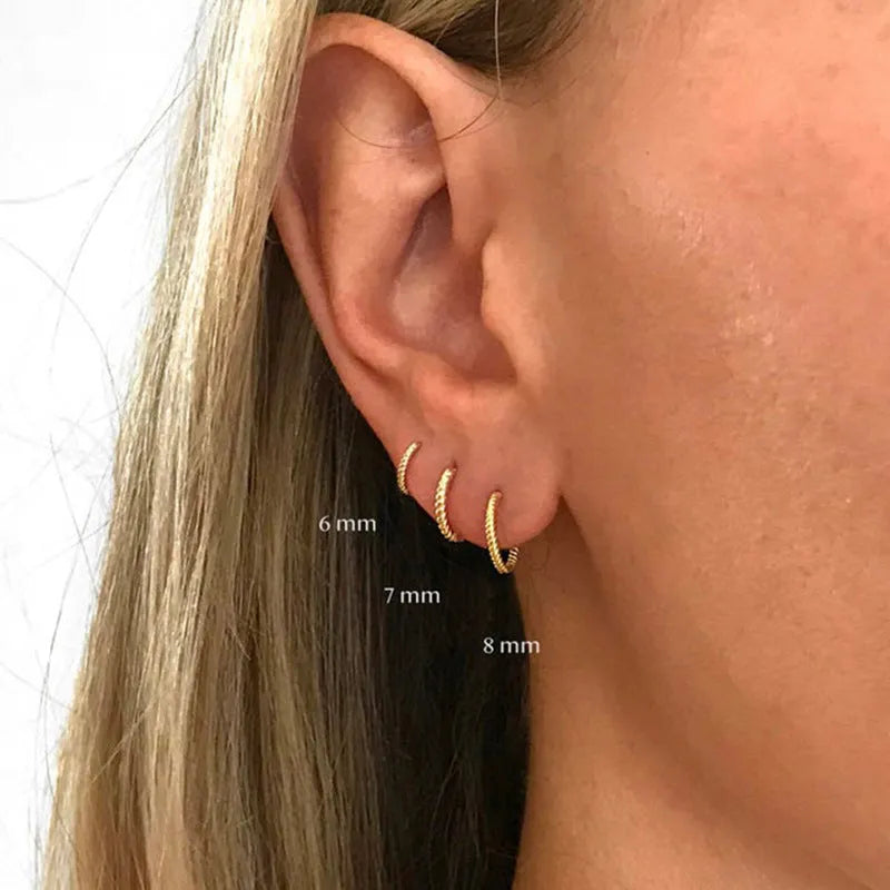 S925 sterling silver twisted string round hoop earrings in gold or platinum finish.