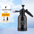 Black hand-held 2L foam sprayer watering can with nozzle, for garden and car washing.