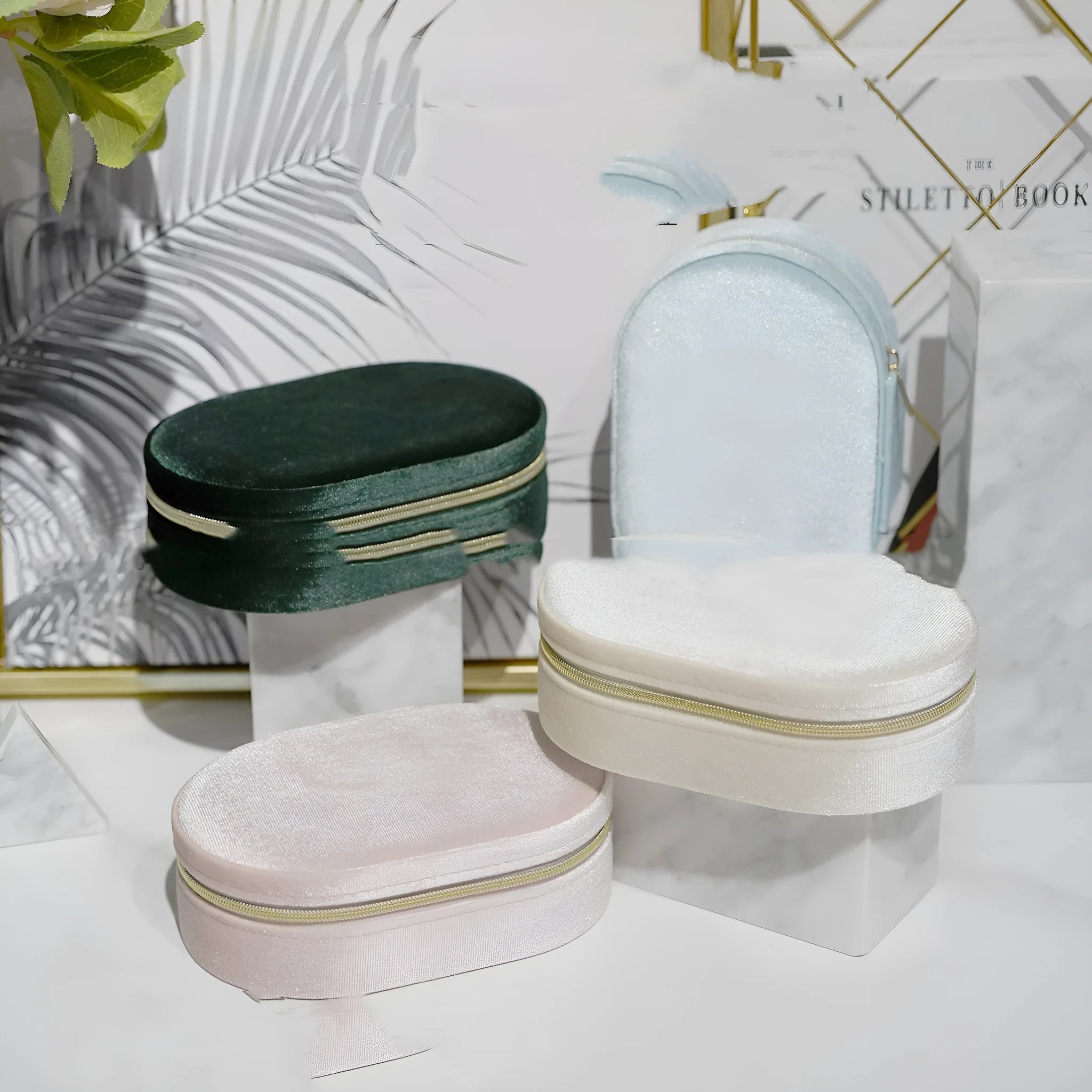 Korean style oval velvet jewellery box in multiple colours with flannel lining, shown with dimensions 15x10x5cm