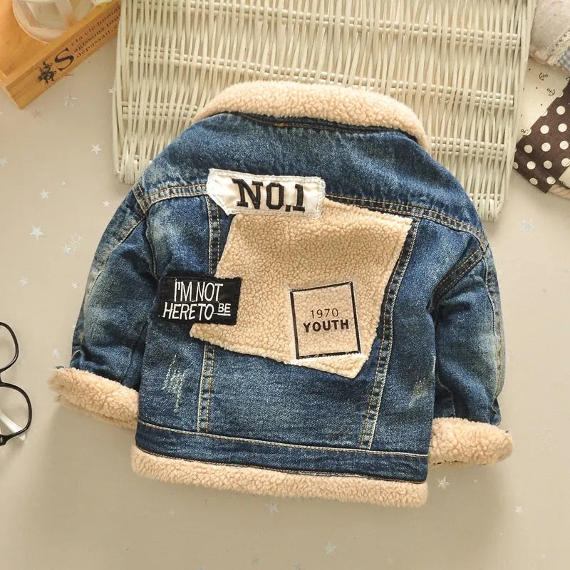 Children's thickened Korean style fur collar denim jacket with square collar in denim colour on model