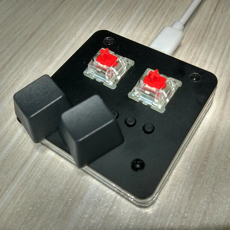 Mini USB wired keyboard in choice of colours with multimedia keys for audio control.