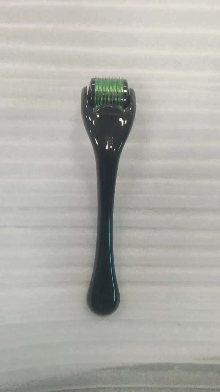 Black handle microneedle roller with purple wheel showing 540 needles, next to white and blue handle options.
