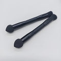 Double-headed miter sponge concealer brush with wooden handle and black artificial fibers