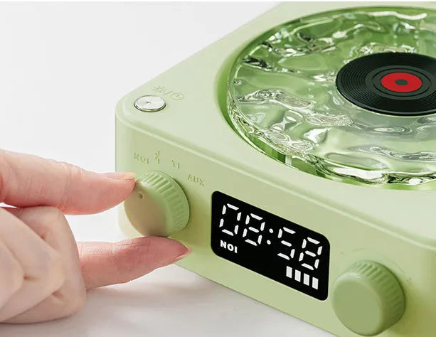 Retro turntable speaker with transparent water ripple turntable, Bluetooth 5.0, and white noise feature in a compact design