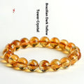 Natural yellow citrine bracelet with geometry-shaped beads in various sizes on display
