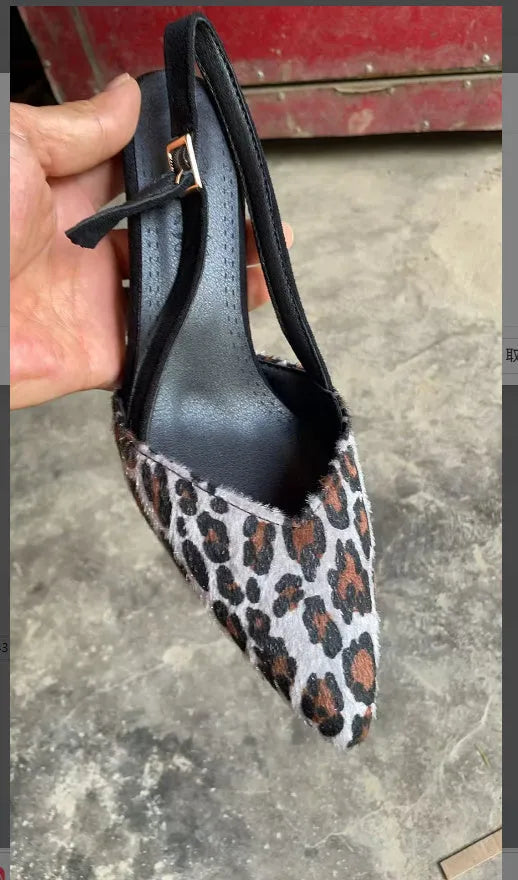 Leopard print suede women's pointed toe open sandals on a white background.