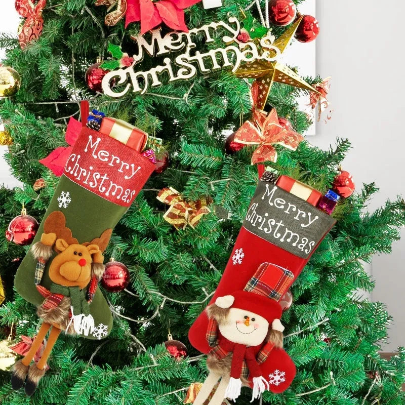 Set of three large Christmas stockings with Santa, Snowman, and Reindeer 3D designs hanging on a fireplace