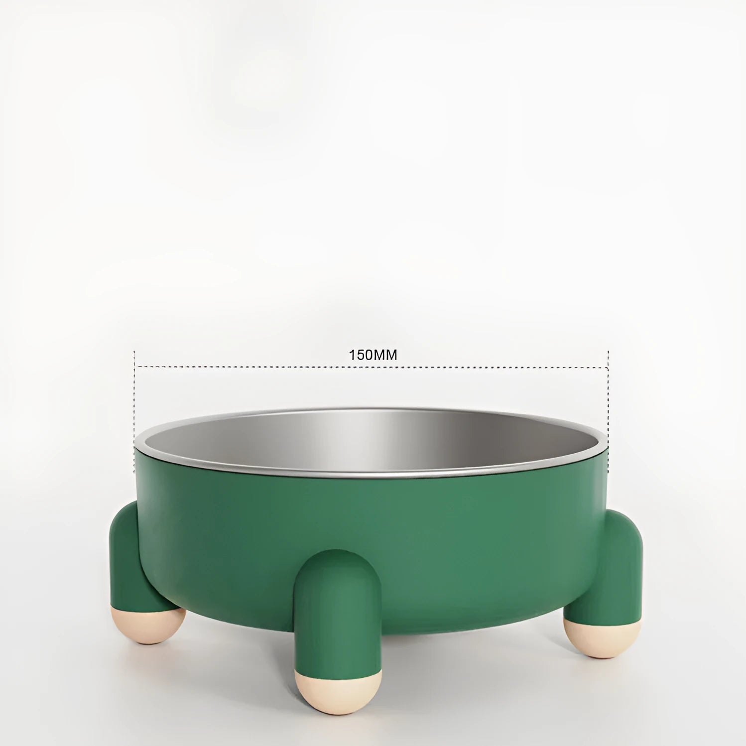 Green stainless steel pet bowl with a non-slip rubber ring and raised foot design on a wooden floor.