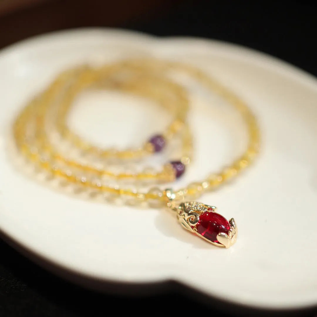 Natural Brazil gold rutilated quartz bracelet with three gold circles and ruby quartz charms in Chinese style