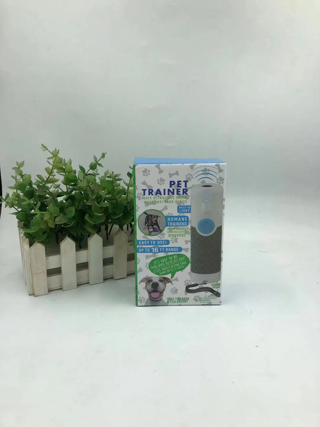 White ABS plastic handheld ultrasonic dog bark trainer device