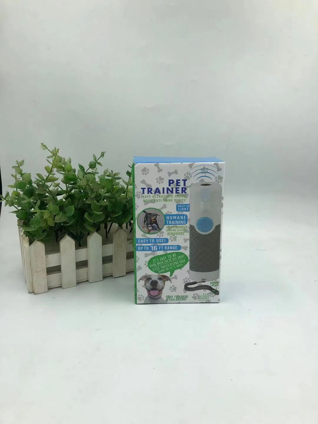 White ABS plastic handheld ultrasonic dog bark trainer device