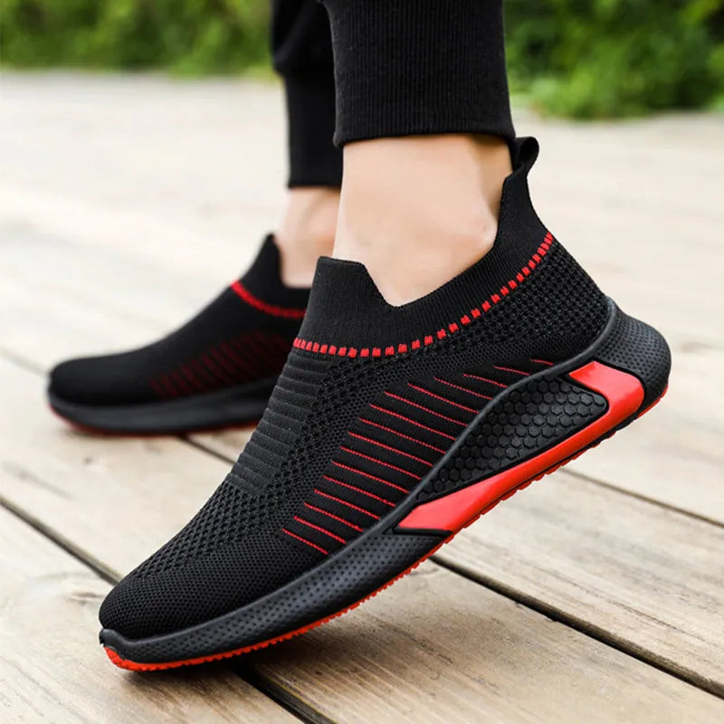 Men's mesh slip-on sneakers with striped design and Flyknit upper in lace-up running shoe style