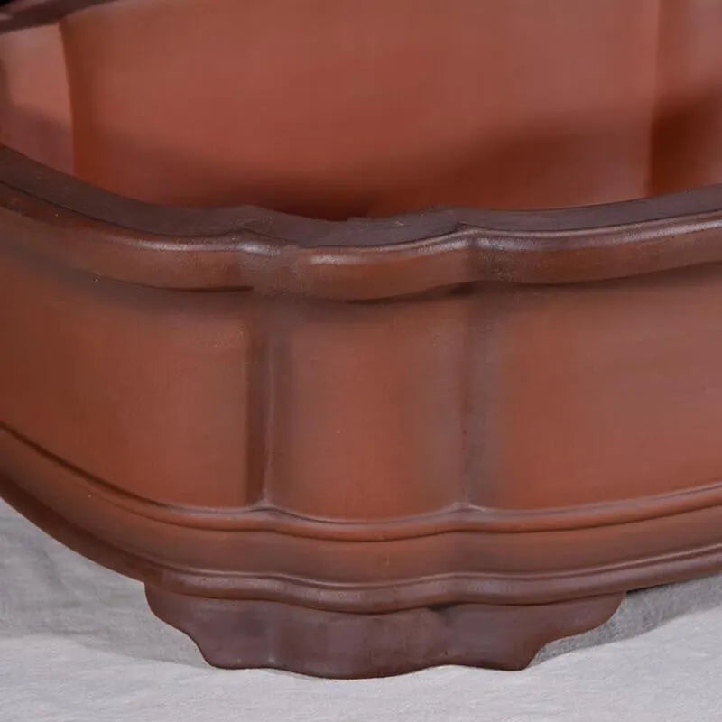 Large rectangular purple clay flowerpot with antique jade finish and Chinese crabapple carvings