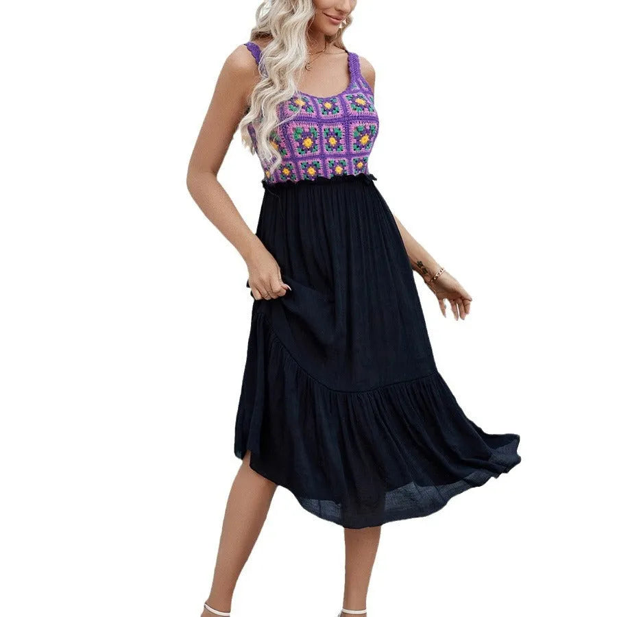 Purple women's sleeveless dress with detailed floral embroidery stitching on the front.