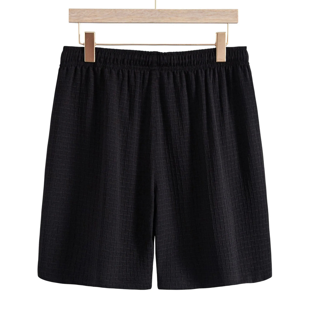 Men's black cotton blend shirt and shorts casual set laid flat