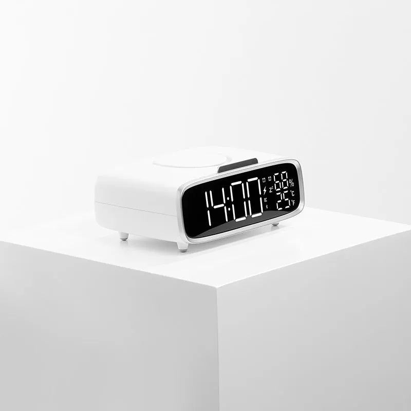White ABS acrylic Bluetooth speaker with wireless charging pad and integrated night lamp