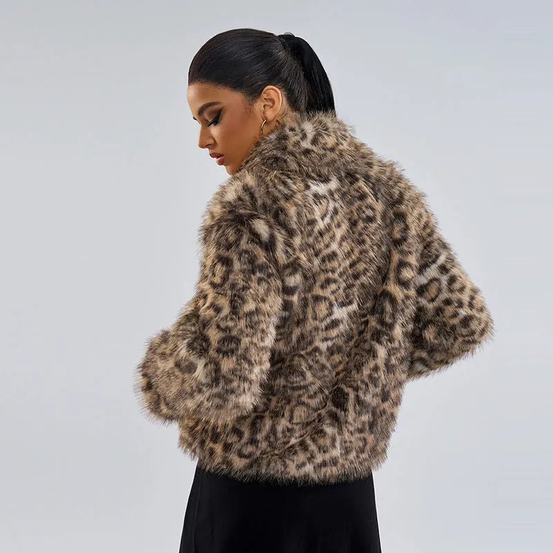 Women's leopard print coat with metallic buckle detail on lapel, regular sleeves, polyester construction