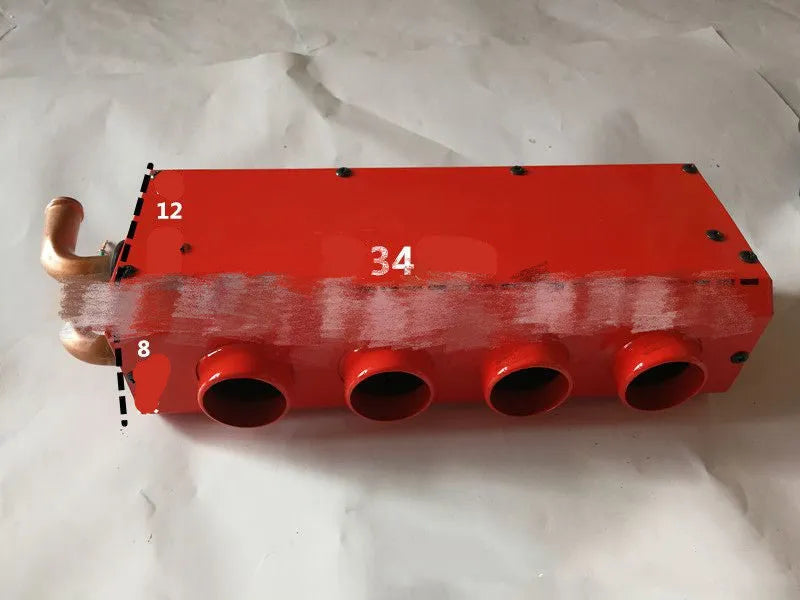 Metal car heater with four small copper pipes and two connection joints for 12V 24V vehicle heating.
