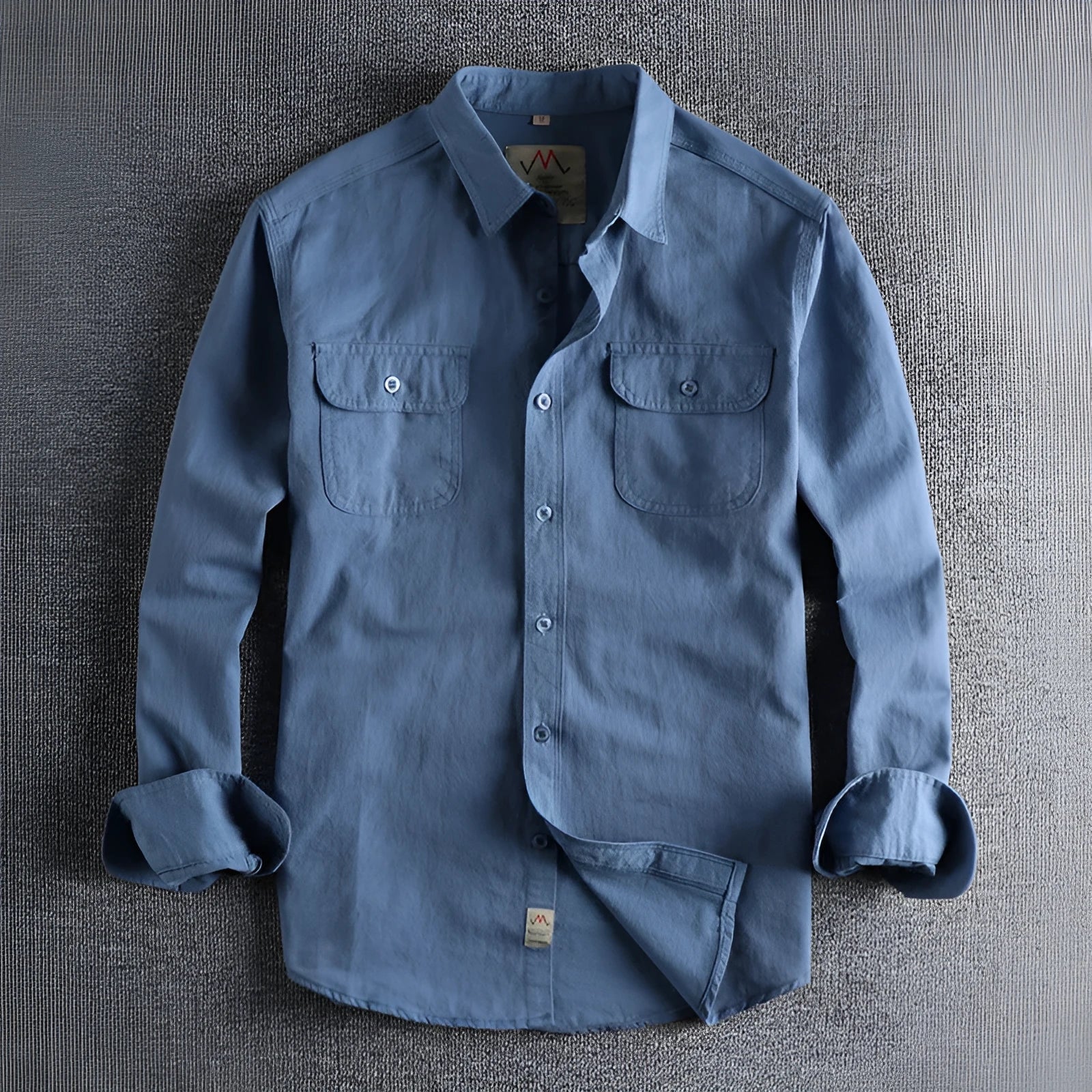 Men's light blue British retro style cotton cardigan shirt with long sleeves on a hanger.