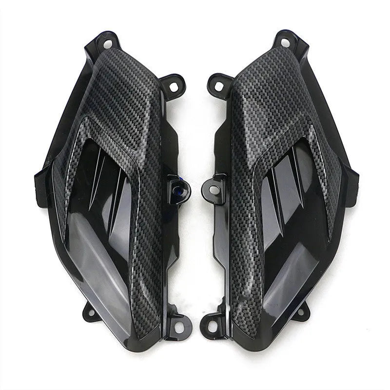 Yamaha NMAX scooter side lamp LED replacement kit with carbon fibre decoration showing blue and red light options