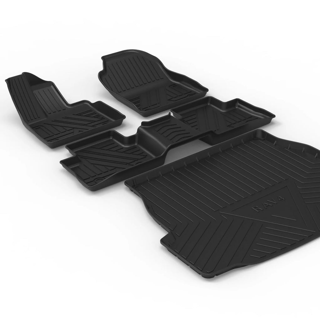 Black car boot liner with carbon fibre pattern texture, laid flat showing its tailored shape.