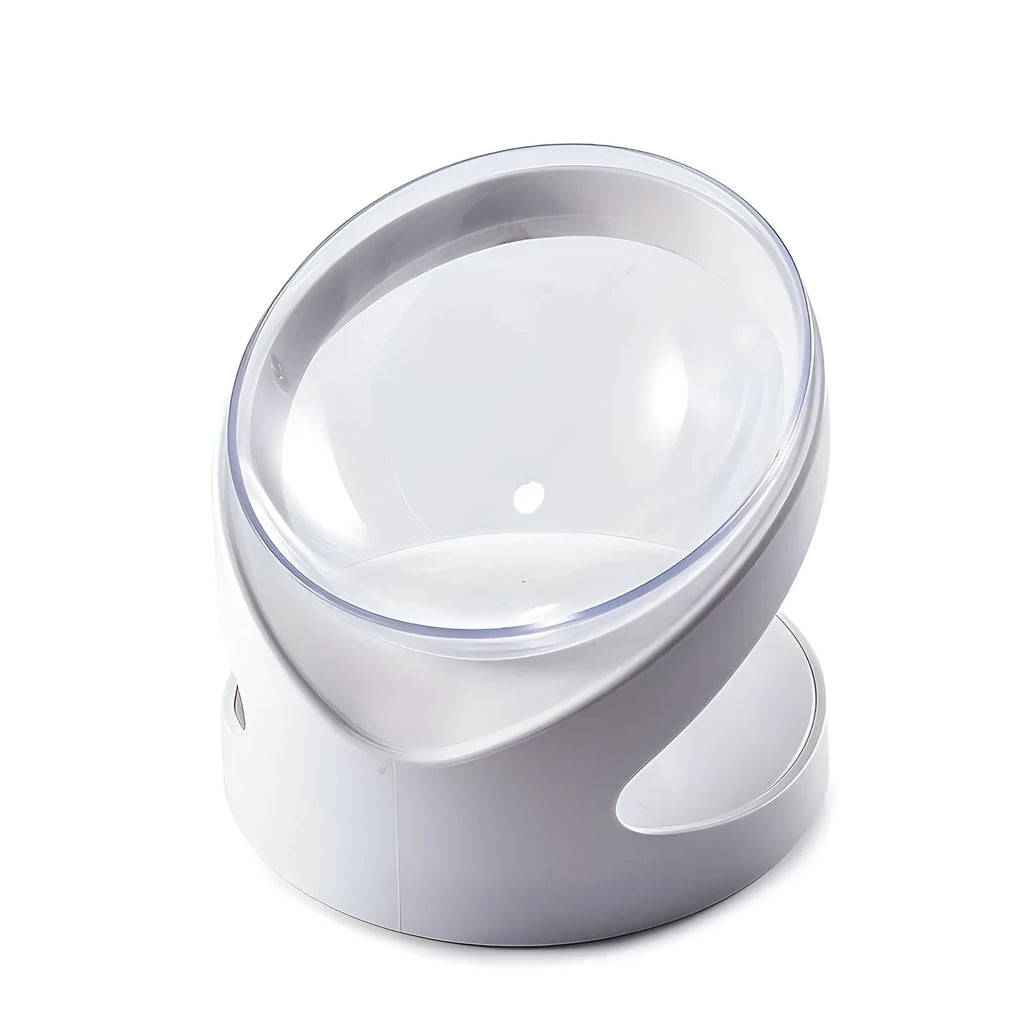 White elevated tilted plastic cat food bowl on a flat surface